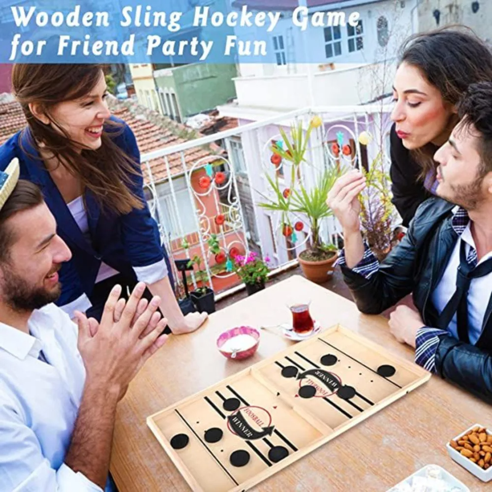 Interactive Tabletop Hockey Game with Quick Slingshot